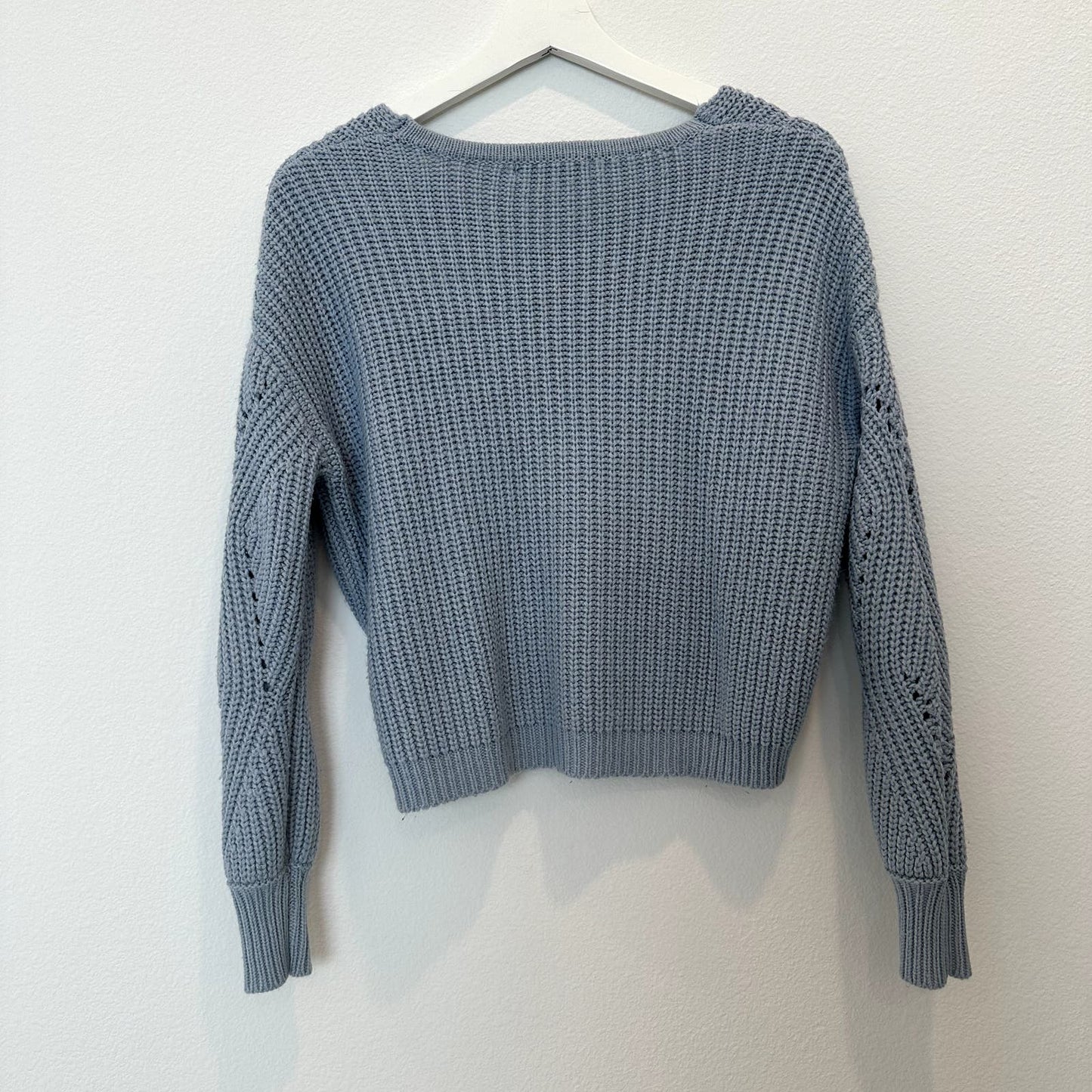 Light blue cutout v-neck knit sweater