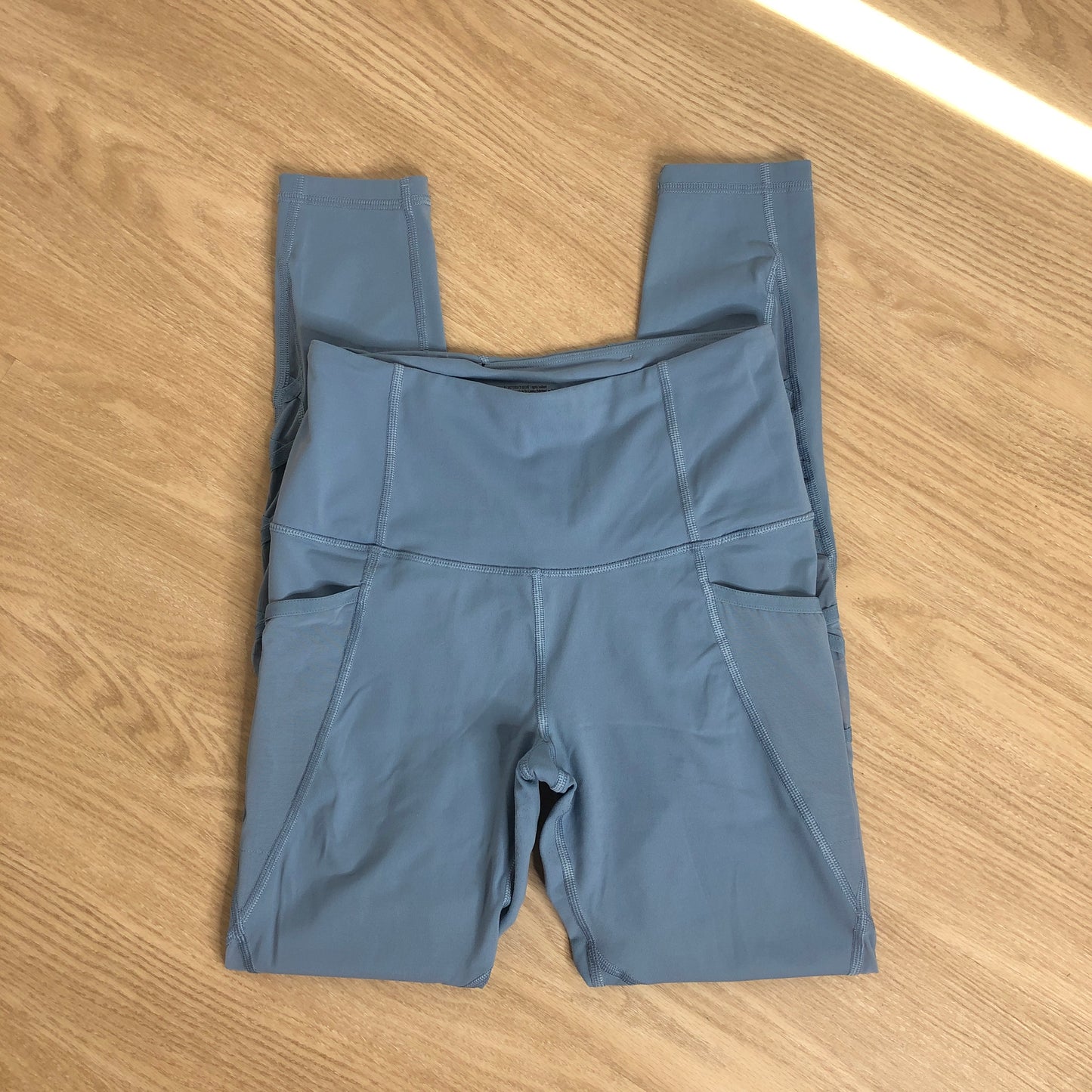 Victoria Sport light blue mesh criss cross athletic workout leggings pockets