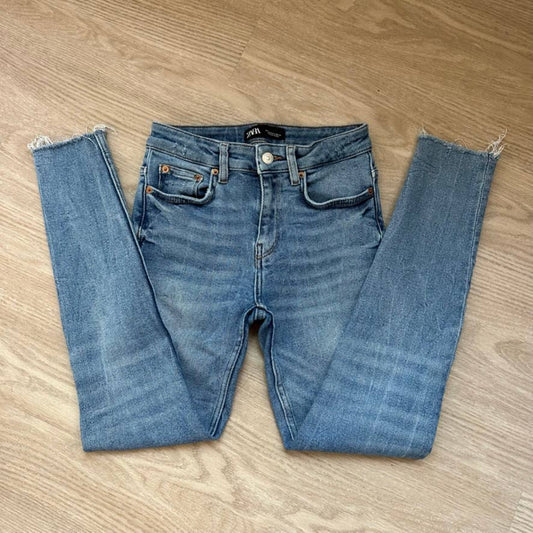 Zara medium blue distressed ripped raw hem high waisted skinny jeans