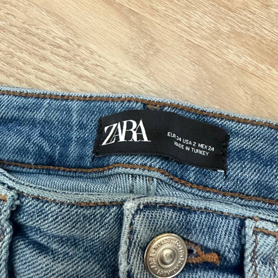 Zara medium blue distressed ripped raw hem high waisted skinny jeans