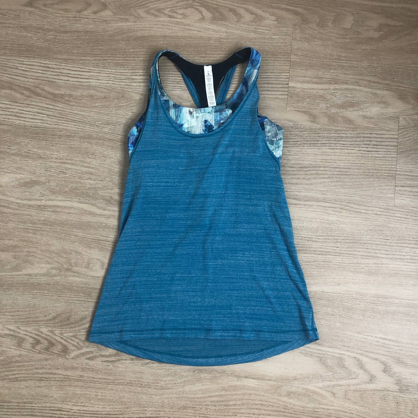 Lululemon Twist & Toil blue abstract print tank top with sports bra and padding